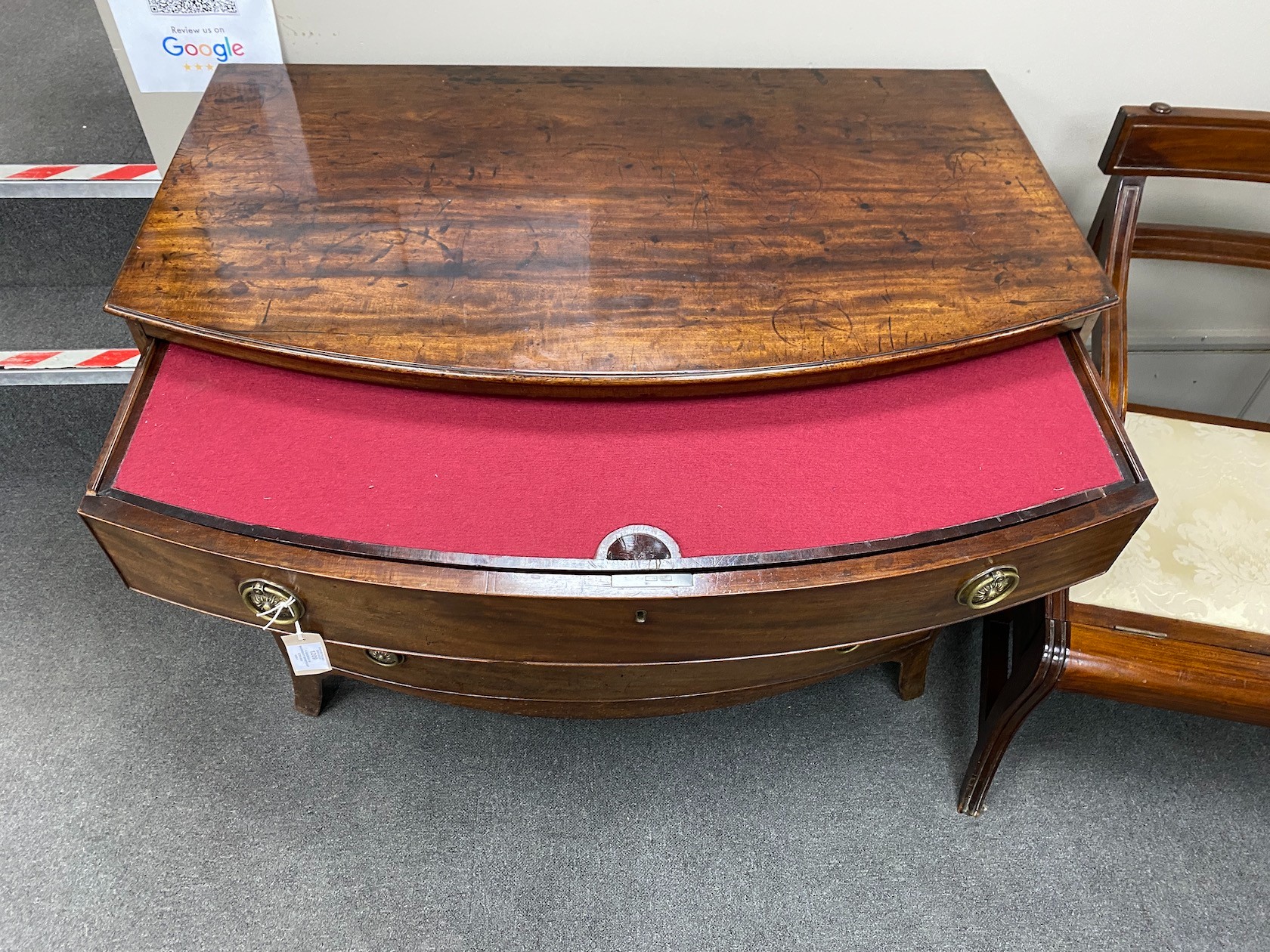 A George III mahogany bowfront dressing chest, with fitted interior, width 106cm, depth 61cm, height 85cm